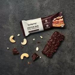 Foodspring Protein Bar Extra Chocolate | Ein proteinreicher Snack für zwischendurch